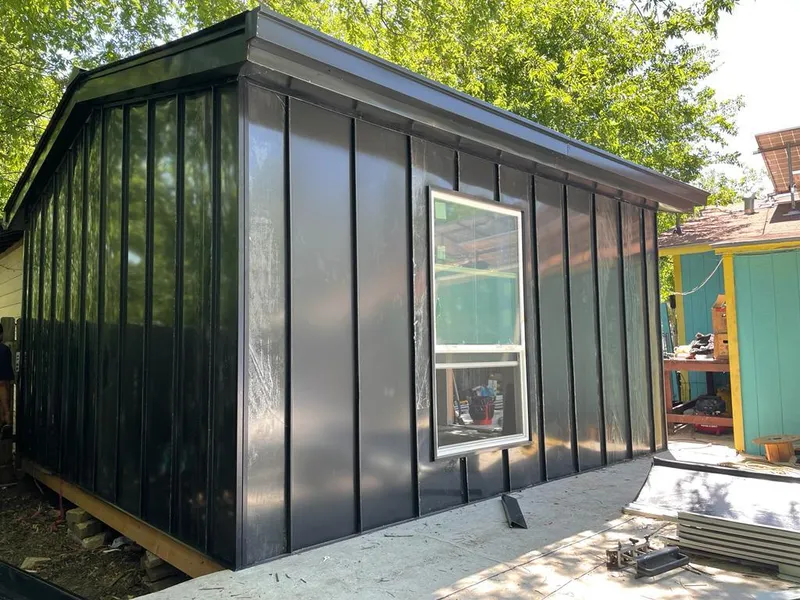 Black standing seam metal wall panels for Metal Roof Installation in Sumpter