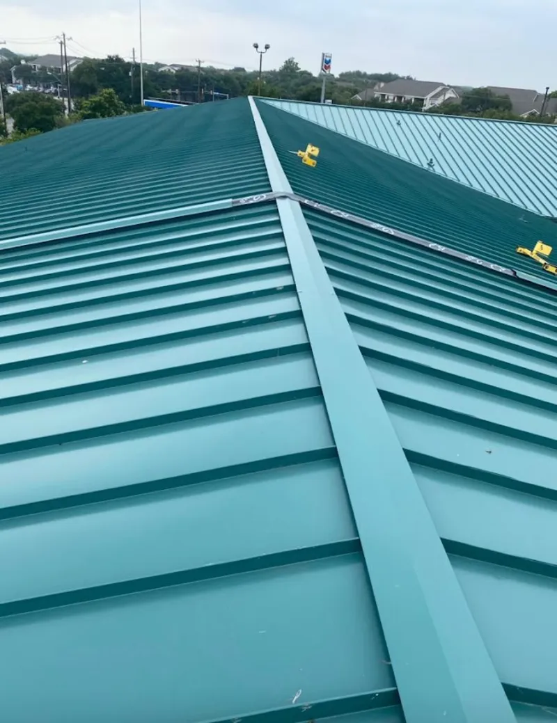Green commercial metal roof ridge and valley for Metal Roof Repair in Sumpter